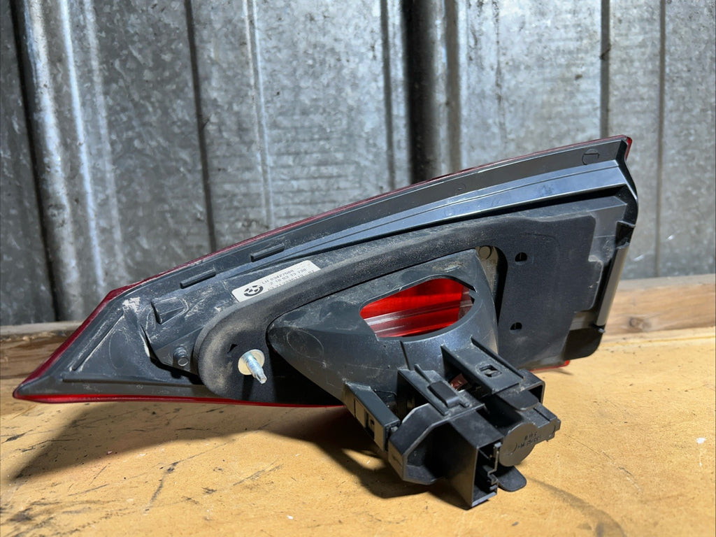 2012-2015 BMW X1 E84 LEFT SIDE DRIVER INNER TAIL LIGHT OEM 2990113 *NOTE*