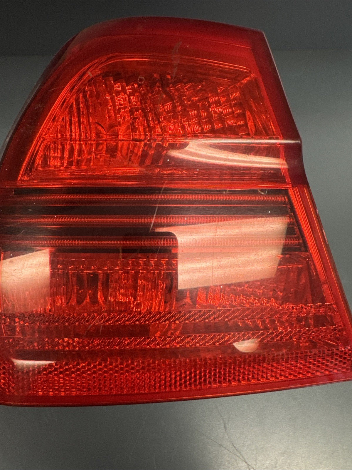2006–2008 BMW 325i E90 Left Rear Tail Light OEM 276301 / 7161955 DRIVERS SIDE