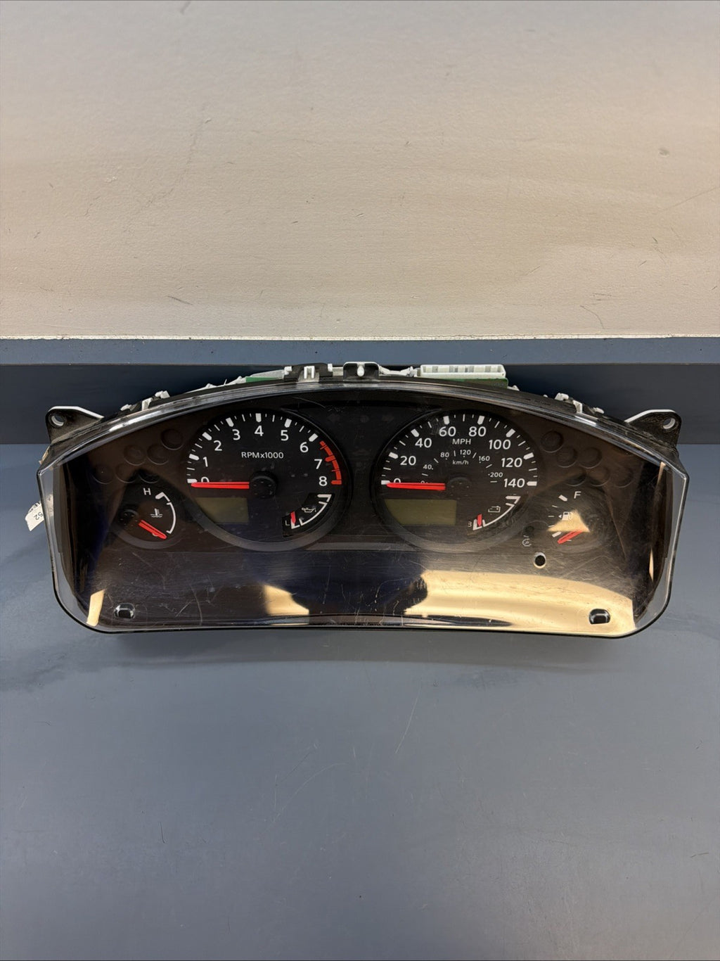 2005-2008 NISSAN XTERRA SPEEDOMETER GAUGE INSTRUMENT CLUSTER W TACH 24810EA04C