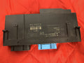 06-11 BMW E90 328 BODY CONTROL MODULE BCM JUNCTION BOX FOOTWELL OEM 9176880