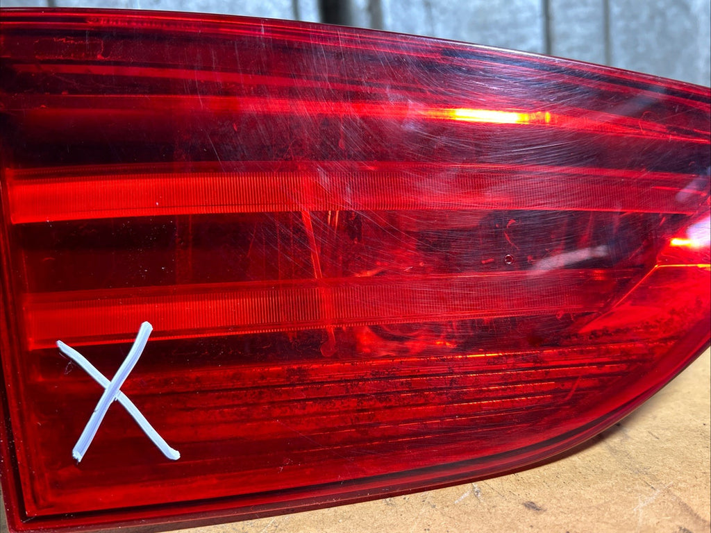 2012-2015 BMW X1 E84 LEFT SIDE DRIVER INNER TAIL LIGHT OEM 2990113 *NOTE*