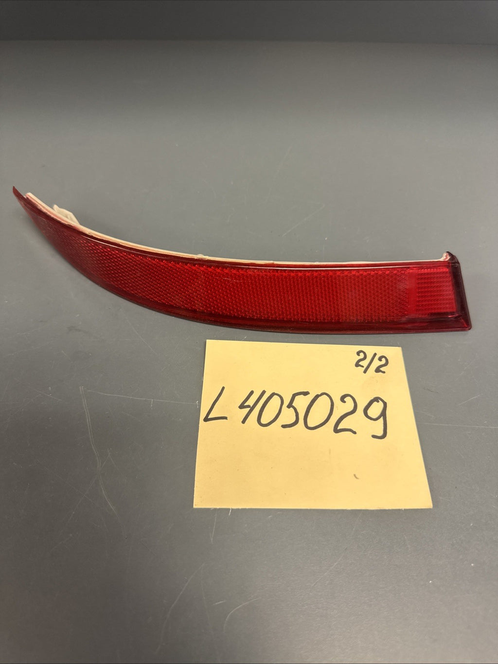 2009 - 2013 BMW X5 E70 REAR LEFT BUMPER LIGHT REFLECTOR 7240997 OEM