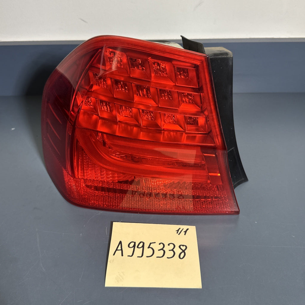 BMW 09-11 E90 LCI LEFT DRIVER SIDE REAR OUTER TAIL LIGHT OEM 7289429