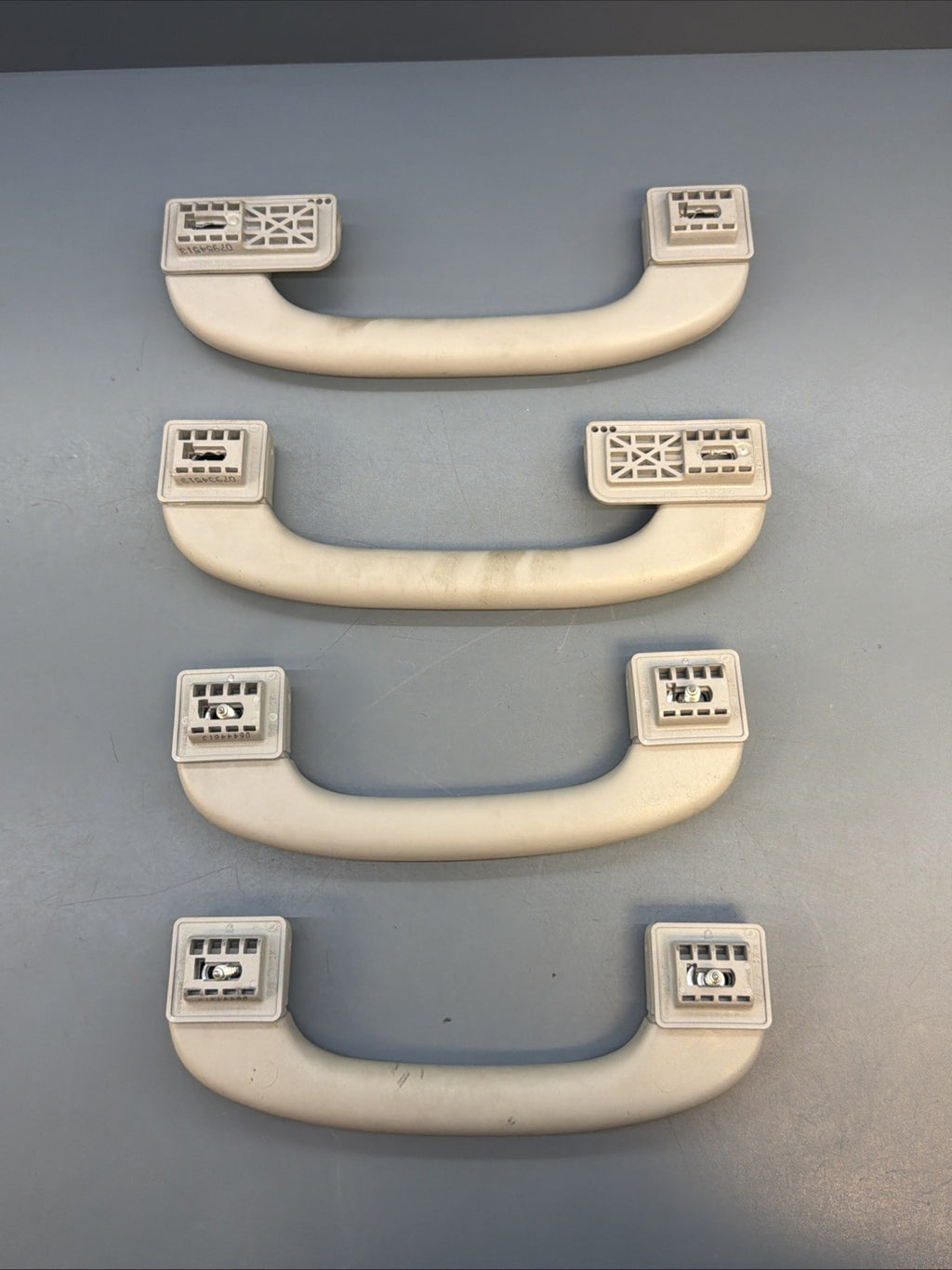 12-2015 BMW X1 E84 FRONT LEFT & RIGHT SIDE UPPER ROOF HANDLE SET GRAY 9143516
